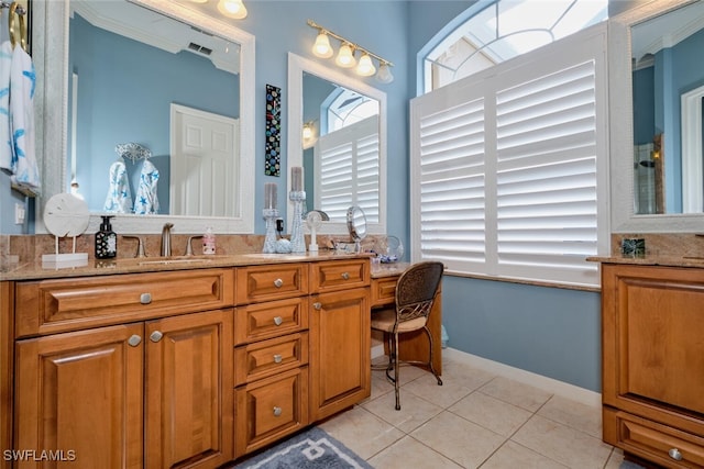 bathroom with tile patterned floors and vanity