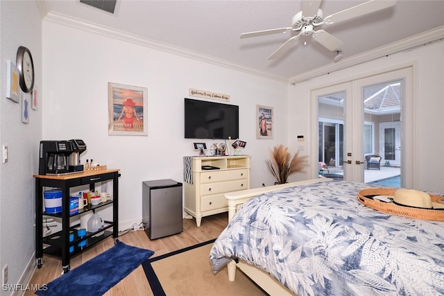 bedroom with access to exterior, french doors, ceiling fan, and ornamental molding