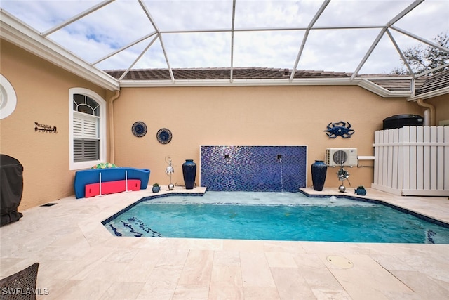 view of swimming pool featuring a lanai, pool water feature, ac unit, and a patio