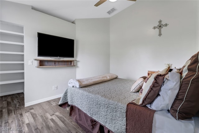 bedroom featuring ceiling fan and hardwood / wood-style flooring