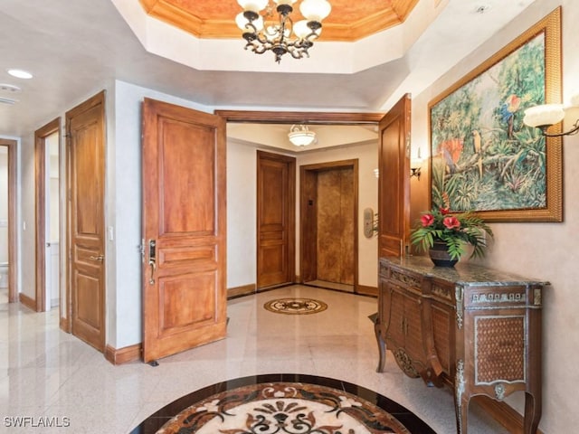 970 Cape Marco Dr Unit 402, Marco Island, FL 34145 - foyer featuring a tray ceiling, baseboards, and ornamental molding