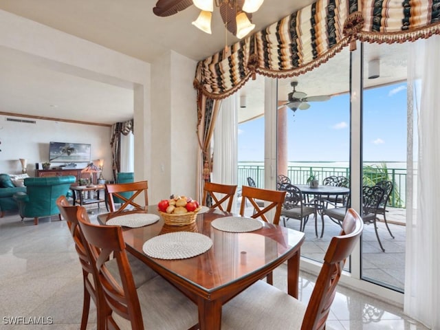 970 Cape Marco Dr Unit 402, Marco Island, FL 34145 - dining area with a ceiling fan