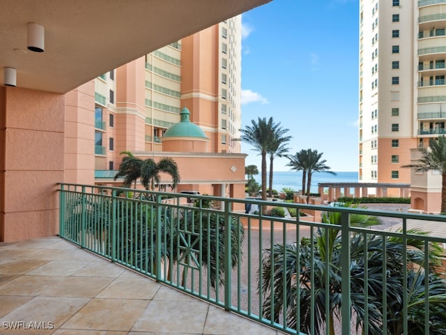 balcony featuring a water view