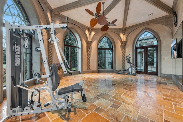 workout area with high vaulted ceiling, ceiling fan, french doors, and a wealth of natural light