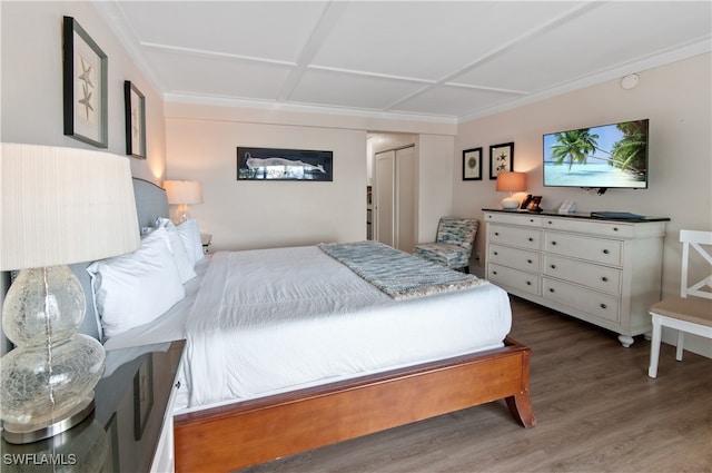 bedroom featuring wood finished floors