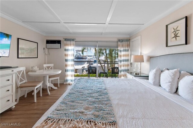 bedroom with a wall mounted air conditioner, access to exterior, coffered ceiling, and wood-type flooring