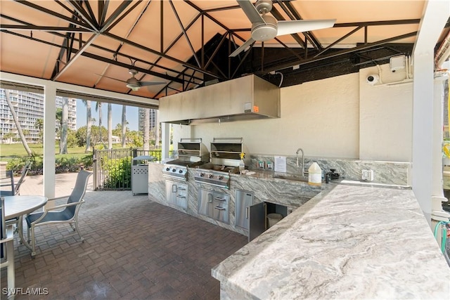 view of patio / terrace with a sink, a gazebo, area for grilling, a grill, and a ceiling fan