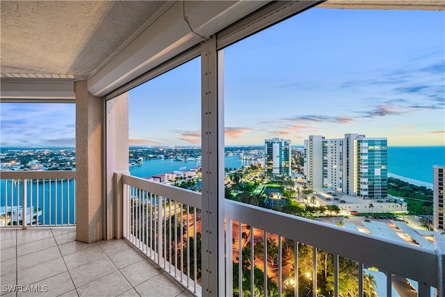 balcony at dusk with a water view