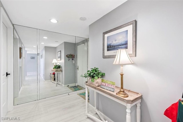 1036 S Collier Blvd Unit 101, Marco Island, FL 34145 - hallway with baseboards and recessed lighting