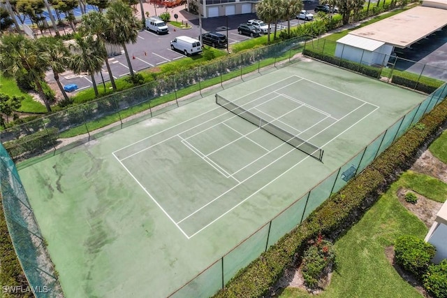 1036 S Collier Blvd Unit 101, Marco Island, FL 34145 - view of tennis court featuring fence