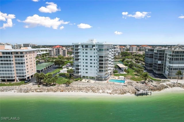 1036 S Collier Blvd Unit 101, Marco Island, FL 34145 - view of urban area featuring waterfront with a beach and apartment complex