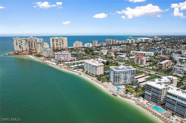 drone / aerial view with a view of the beach and a water view