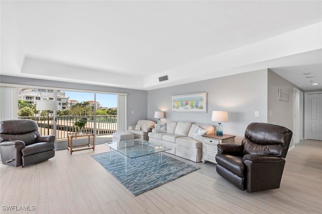 living room with light hardwood / wood-style floors