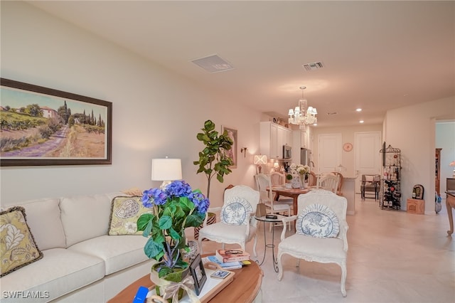 living room with a chandelier