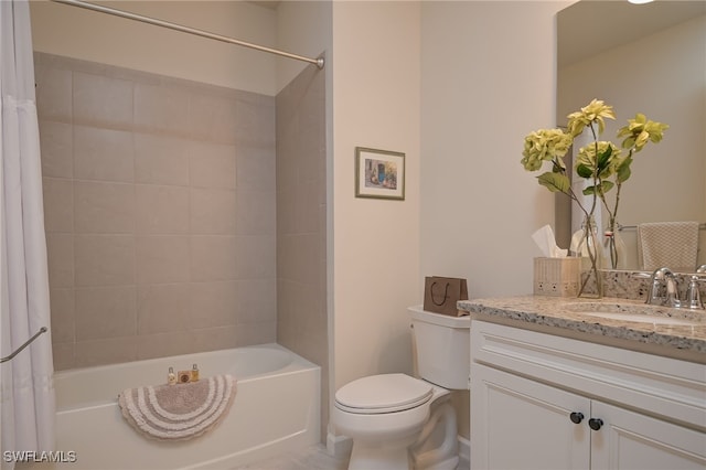 full bathroom featuring shower / tub combo, vanity, and toilet