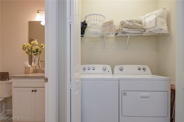 laundry room featuring washer and dryer