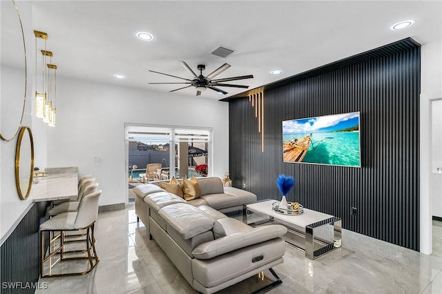 living room featuring ceiling fan