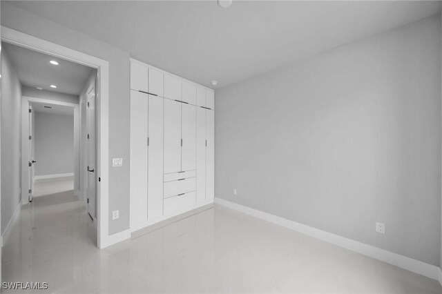 unfurnished bedroom featuring a closet