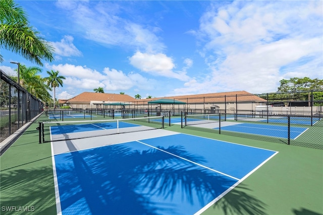 view of sport court featuring basketball hoop