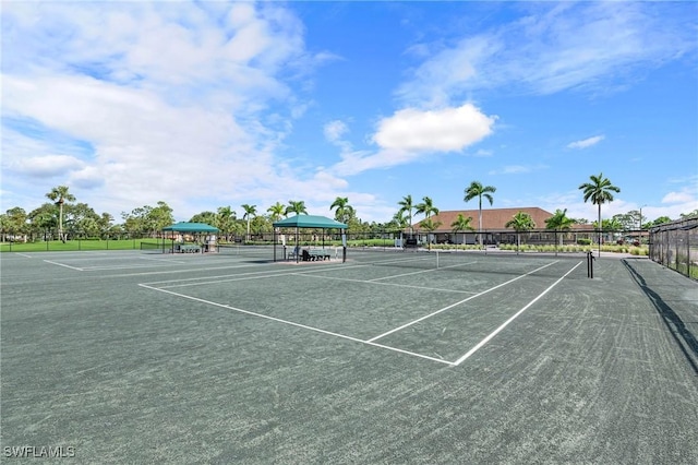 154 Penny Ln Unit 8, Naples, FL 34112 - view of sport court with fence