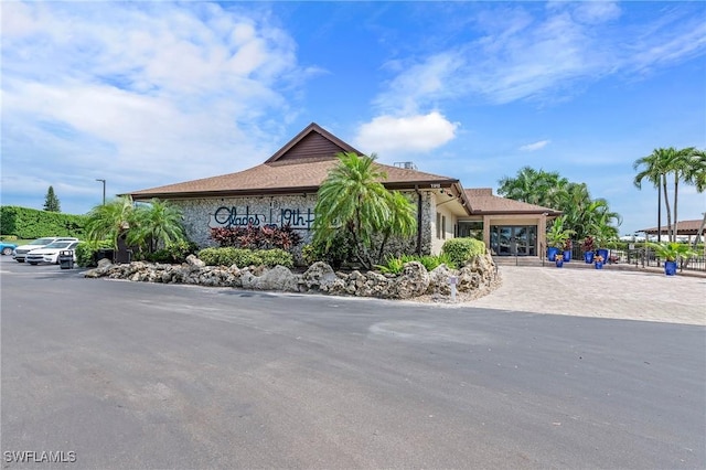 154 Penny Ln Unit 8, Naples, FL 34112 - exterior space featuring stone siding