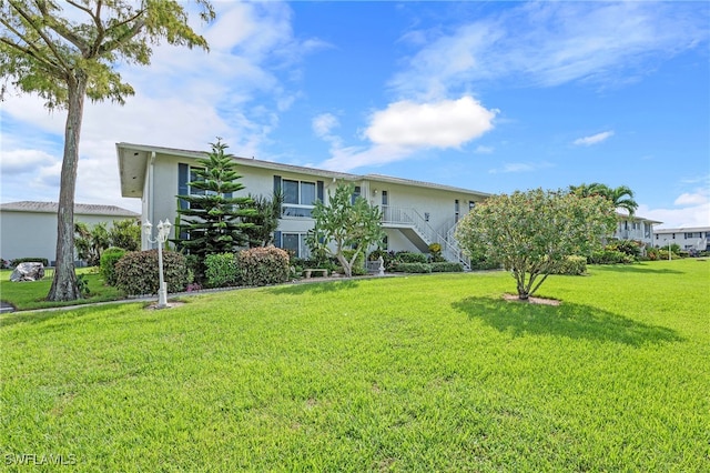 exterior space with a front lawn