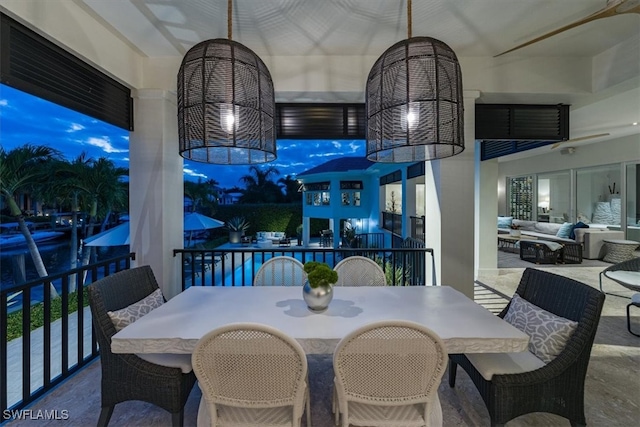 dining space with a towering ceiling