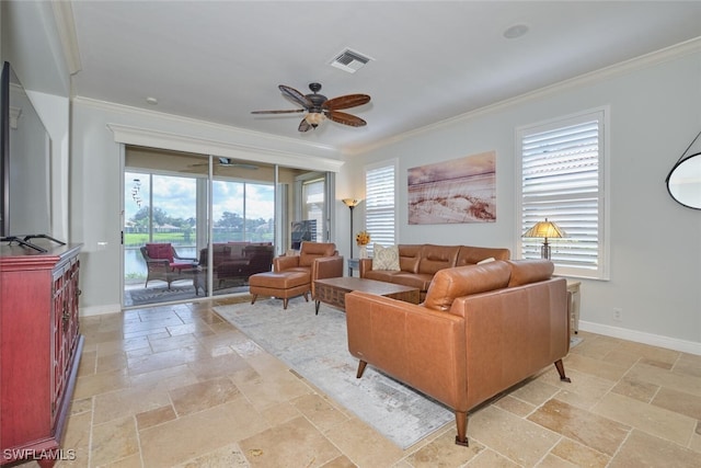 living room featuring ornamental molding, a wealth of natural light, and ceiling fan