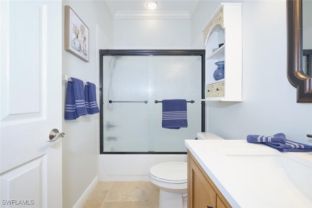 full bathroom with shower / bath combination with glass door, vanity, tile patterned floors, crown molding, and toilet