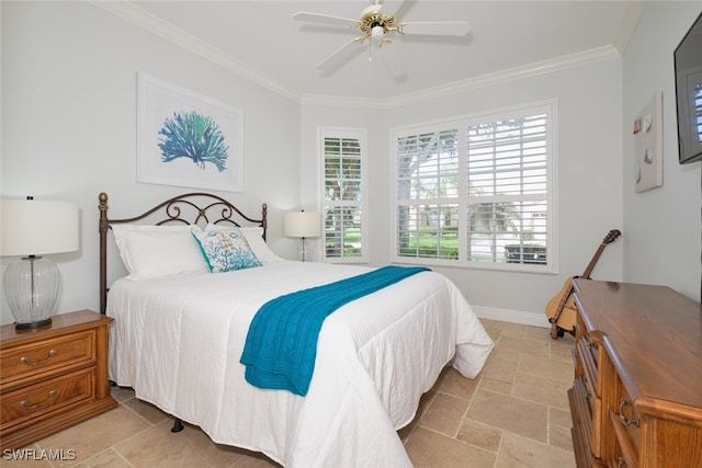 bedroom with ceiling fan and crown molding