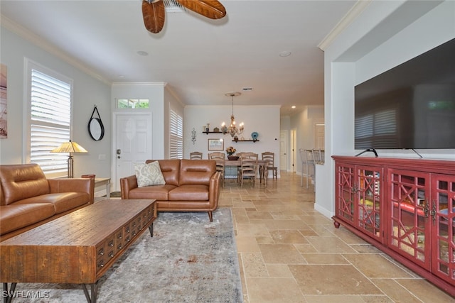 living room featuring ceiling fan with notable chandelier and ornamental molding