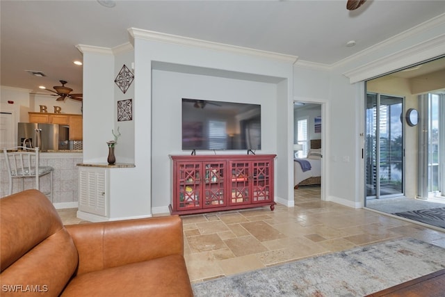 living room with crown molding and ceiling fan