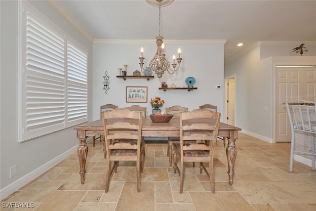 dining room featuring ornamental molding and a chandelier