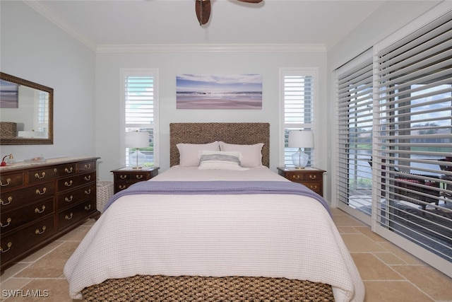 bedroom with ceiling fan, crown molding, access to exterior, and multiple windows