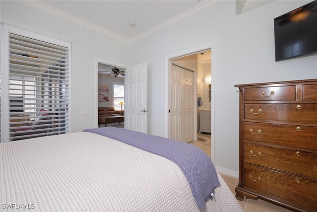 bedroom with light colored carpet, ensuite bath, crown molding, and multiple windows