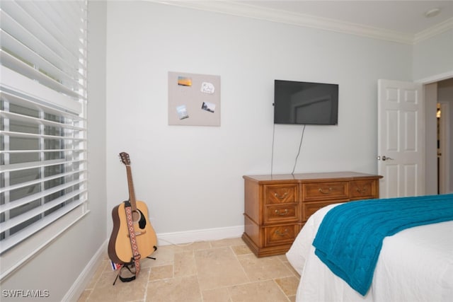 bedroom featuring ornamental molding