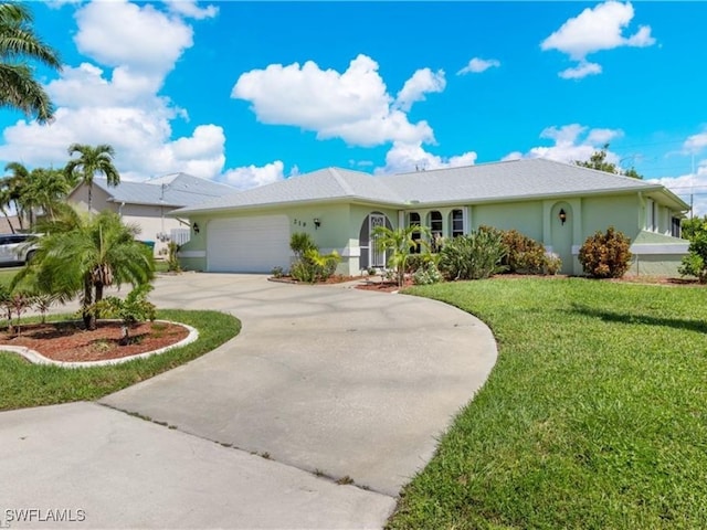 single story home with a front yard and a garage