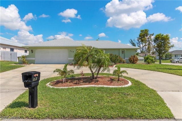 single story home featuring a garage and a front lawn