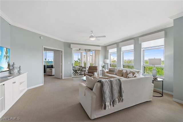 living room with a wealth of natural light, light carpet, and crown molding