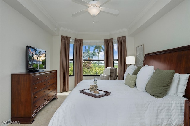 bedroom featuring ceiling fan, light tile patterned flooring, and ornamental molding