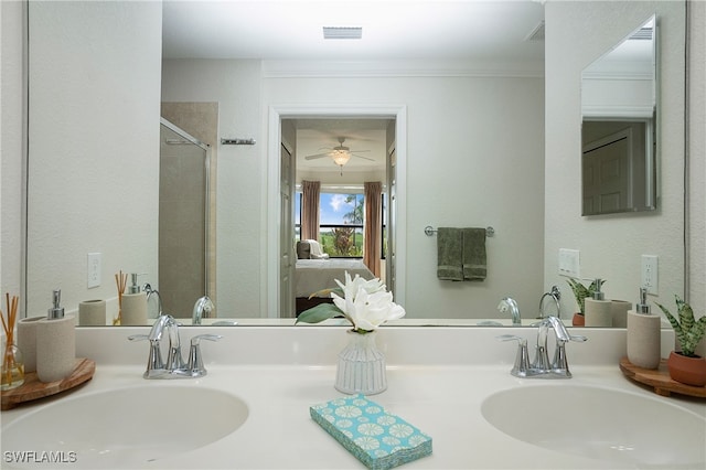 bathroom featuring ceiling fan, a shower, crown molding, and vanity