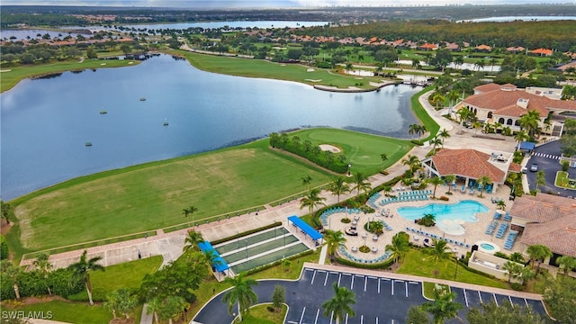 birds eye view of property featuring a water view