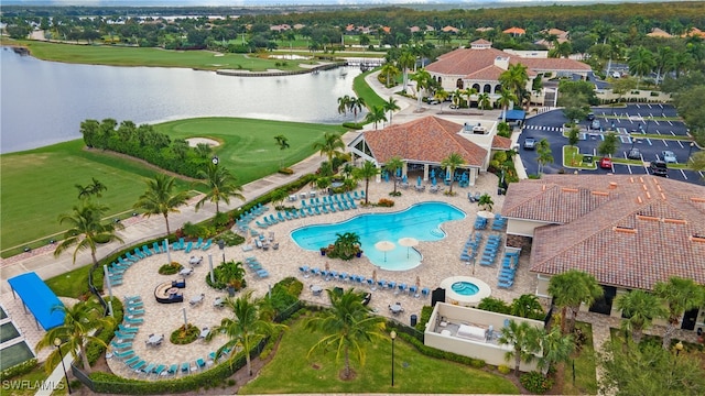 drone / aerial view featuring a water view