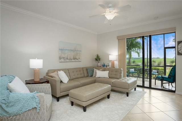 living room featuring ceiling fan, ornamental molding, and light tile patterned floors