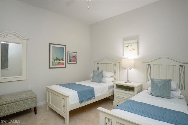 tiled bedroom with ceiling fan