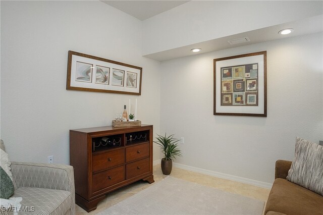 sitting room featuring light tile patterned flooring