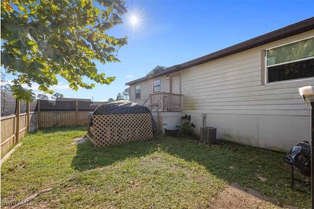 view of yard featuring central AC