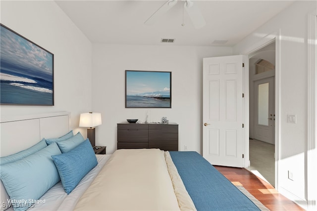 bedroom featuring hardwood / wood-style flooring and ceiling fan