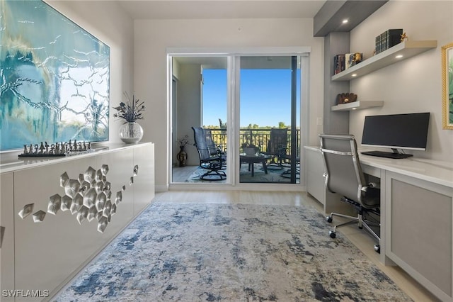 office area with light wood-type flooring