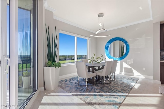 tiled dining room with ornamental molding